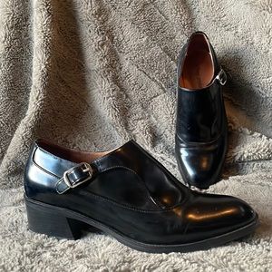 Jeffrey Campbell black leather high heeled buckle loafers